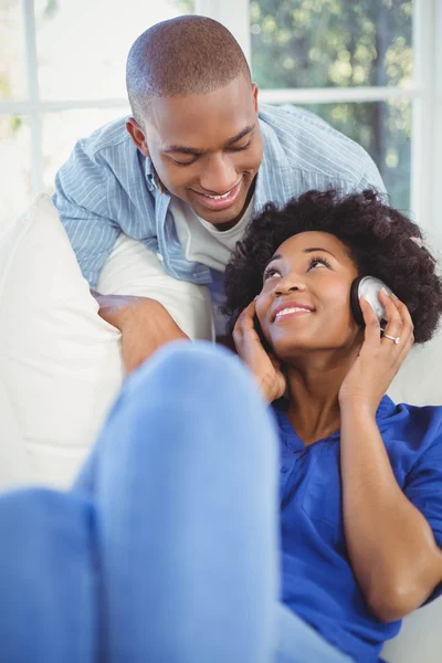 Smiling couple in living room