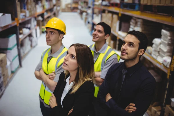 Warehouse manager and workers