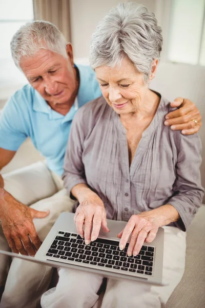 Senior woman using laptop