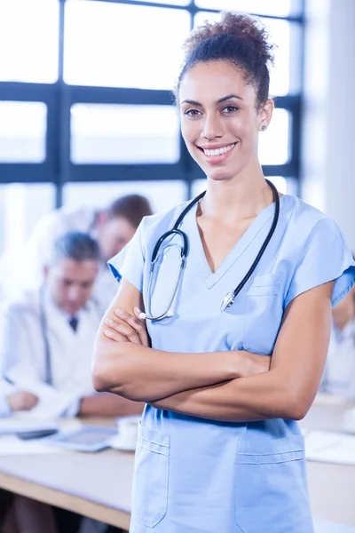 Female doctor smiling at camera