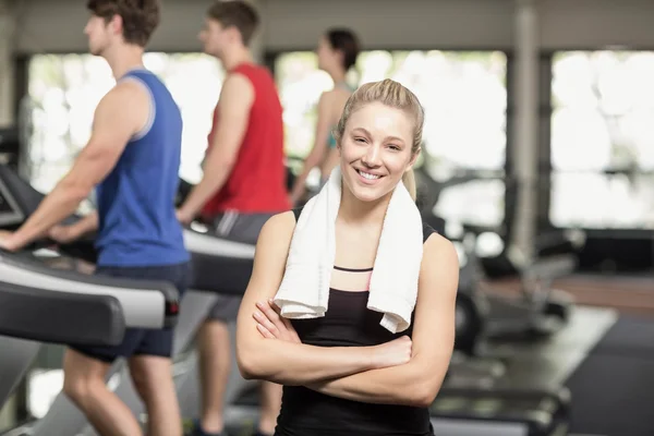 Fit woman with arms crossed