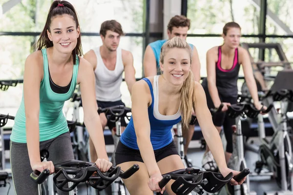 People using exercise bike together