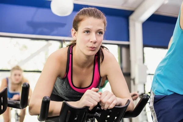 People using exercise bike together