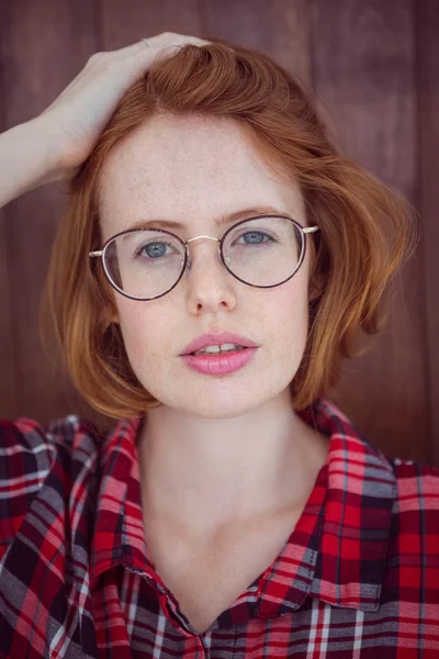 Hipster woman staring into camera