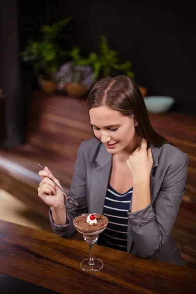 Woman about to eat dessert