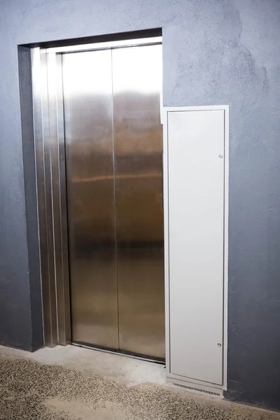 Modern elevator with closed doors