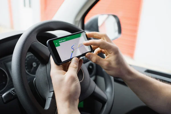 Man using  smartphone as navigation system