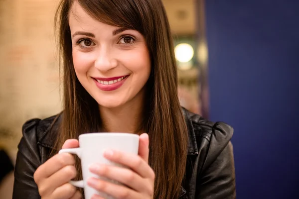 Woman having coffee