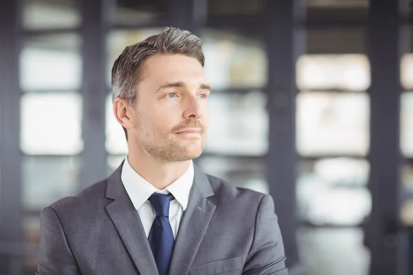 Businessman looking away