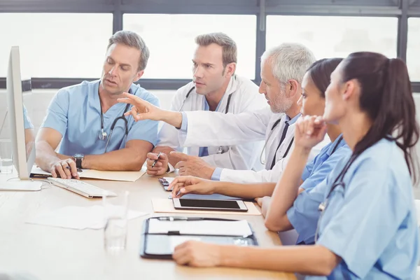 Medical team interacting in conference room