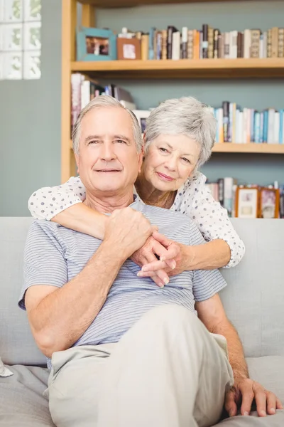 Romantic senior couple in living room