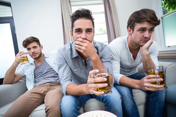 Male friends drinking alcohol