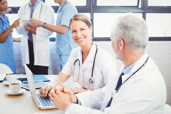 Medical team interacting in conference room