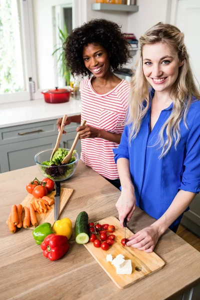 Female friends preparing food