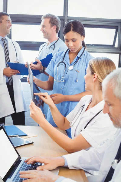 Medical team interacting in conference room