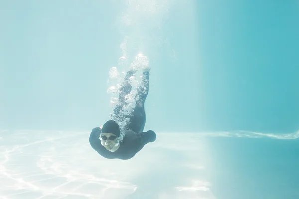 Man swimming underwater