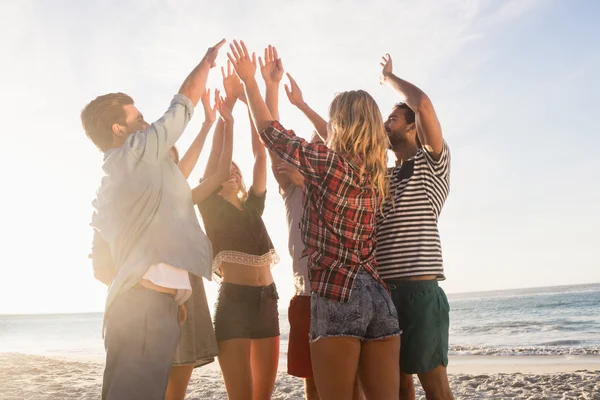 Happy friends giving high five