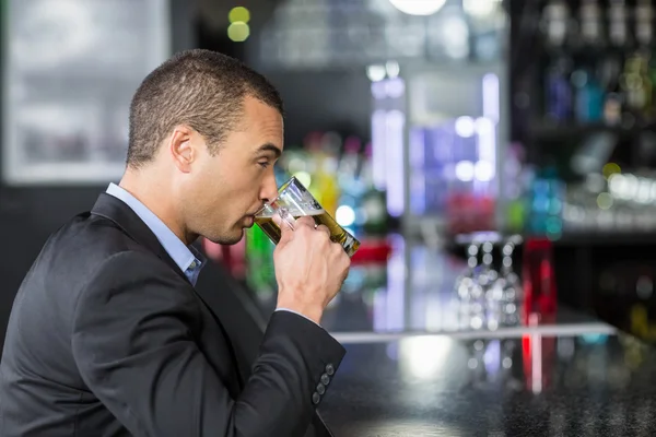 Businessman having a drink