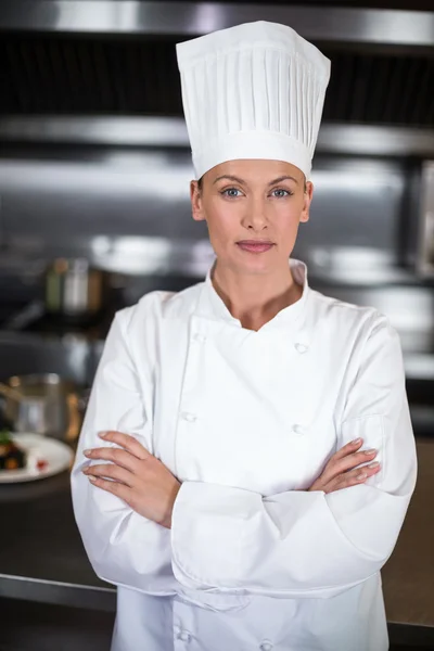 Female chef in commercial kitchen