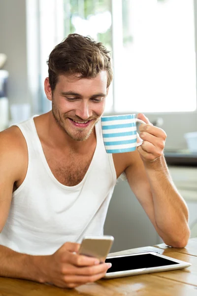 Happy man having coffee