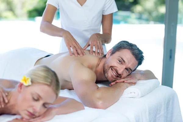 Man receiving back massage