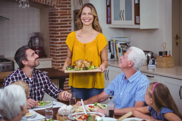 Happy family at dining table