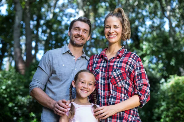 Portrait of happy family in back yard