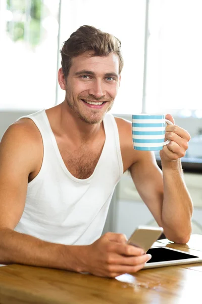Happy man having coffee