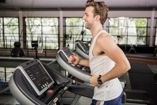 Man running on thread mill