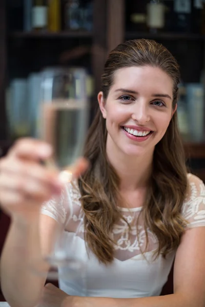 Woman holding champagne flute