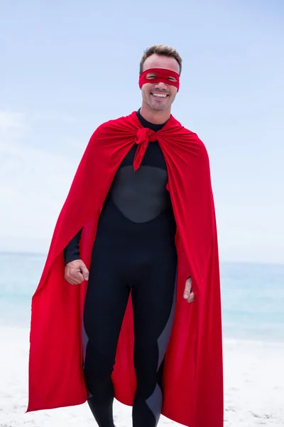 Man in superhero costume walking