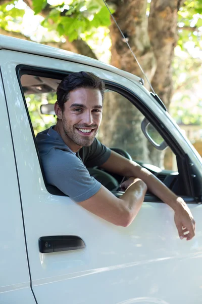 Man sitting in van