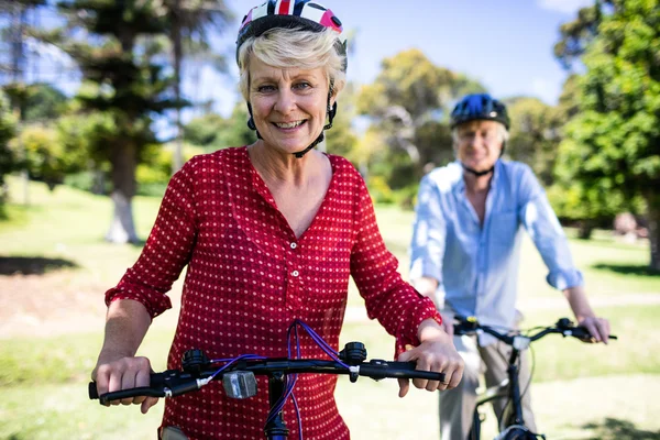 Senior woman riding bicycle