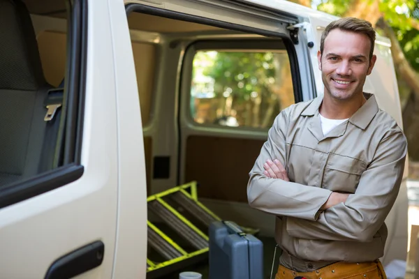 Handyman with tool belt around waist