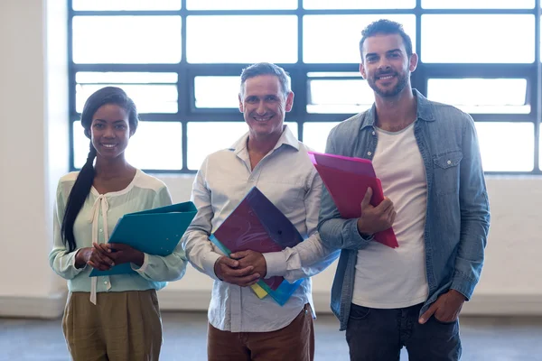 Happy Colleagues with file and folder