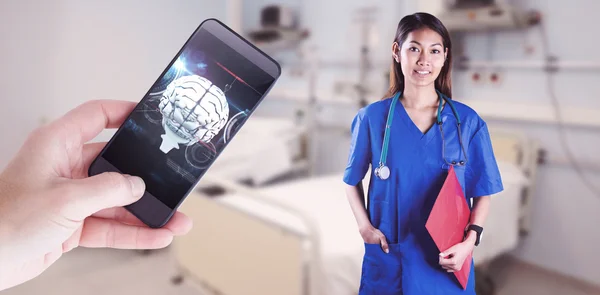 Nurse with stethoscope looking at camera