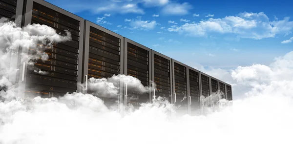 Server towers against blue sky