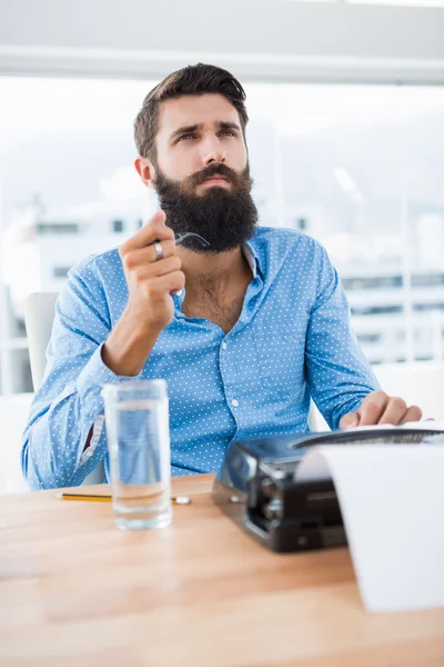 Hipster using type writer