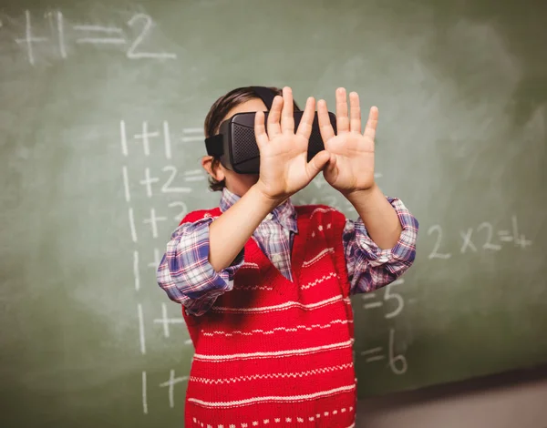 Boy using a virtual reality device