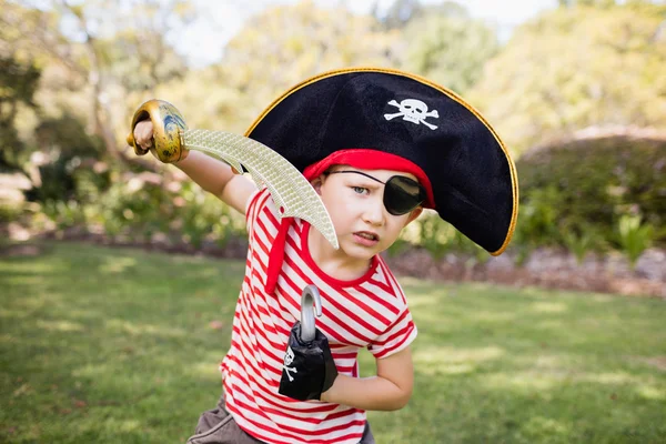 Portrait of cute boy pretending to be a pirate