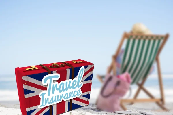 Travel insurance message on a british suitcase
