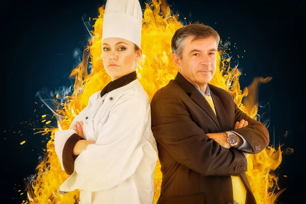 Portrait of chef and businessman back to back