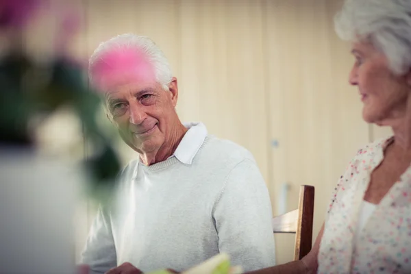 Pensioners at lunch in retirement house