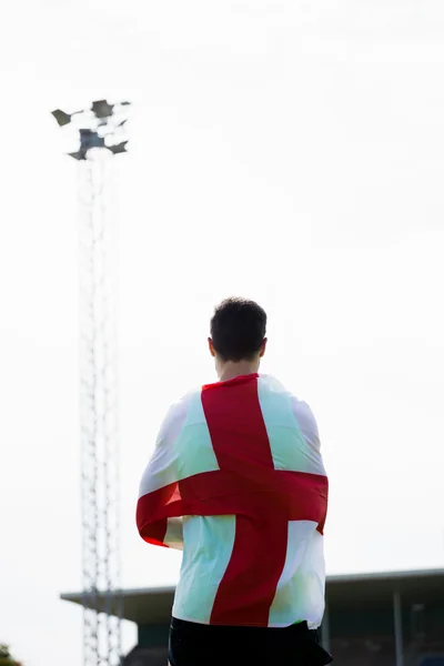 Athlete with england flag wrapped