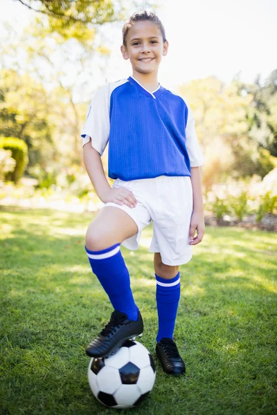 Girl wearing soccer uniform