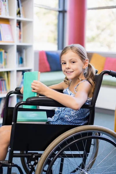 Disabled school girl on wheelchair