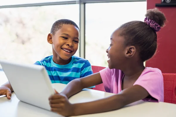 School kids using tablet