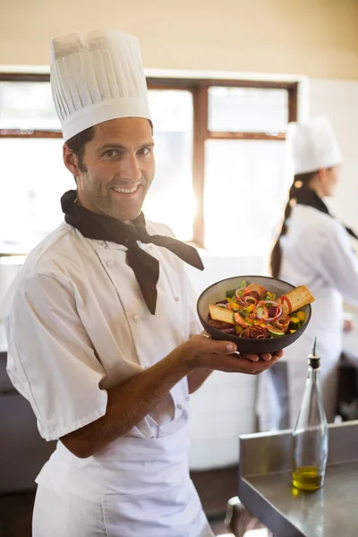 Head chef presenting his salad