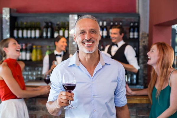 Man holding wine glass