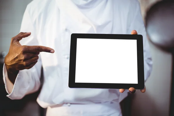 Chef holding digital tablet